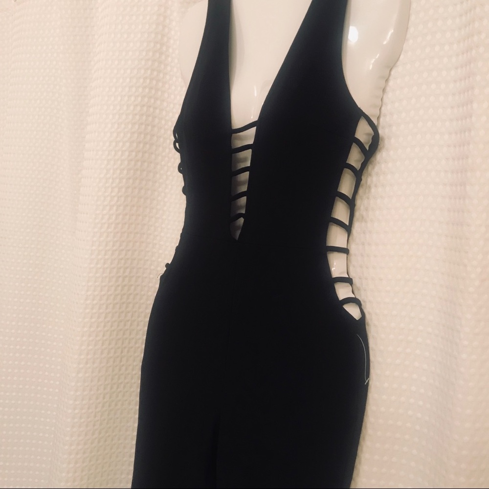 Charlotte Russe black romper cross straps